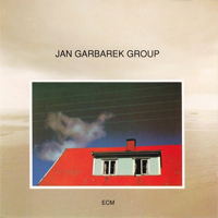 Jan Garbarek Group - Photo with Blue Sky, White Cloud, Wires, Windows and a Red Roof - 